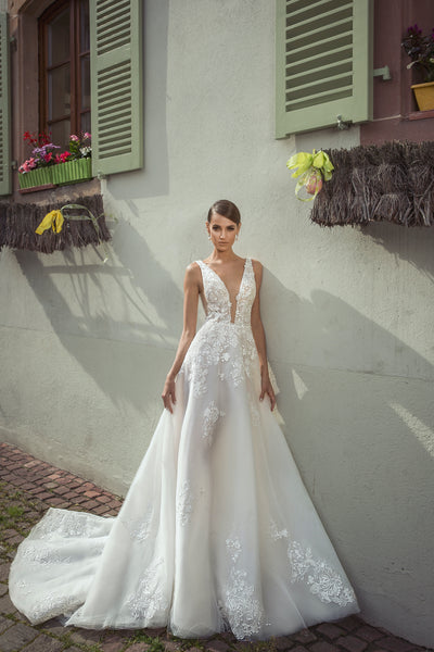 Brautkleid mit extra Cape aus Spitze und Tüll